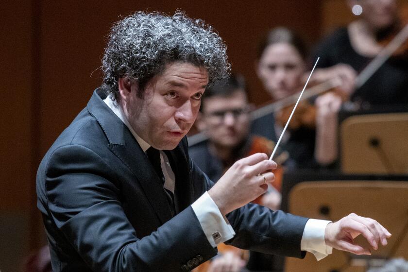 LOS ANGELES, CALIF. -- SATURDAY, NOVEMBER 2, 2019: Gustavo Dudamel conducts the LA Phil during performance of Bruckner’s Fourth Symphony at the Walt Disney Concert Hall in Los Angeles, Calif., on Nov. 2, 2019. (Brian van der Brug / Los Angeles Times)