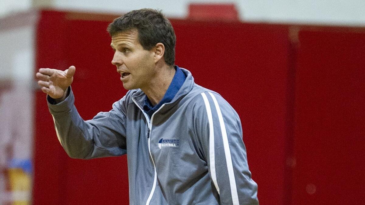 Newport Harbor High coach Bob Torribio, pictured giving instructions to his team at Loara on Nov. 27, was unable to lead the Sailors past Villa Park in the semifinals of the Grizzly Invitational on Friday.