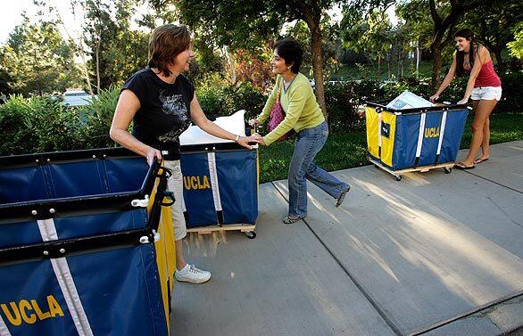 As freshman began arriving on campus this weekend, UCLA provided wheeled containers to help them move their belongings into the dorms.