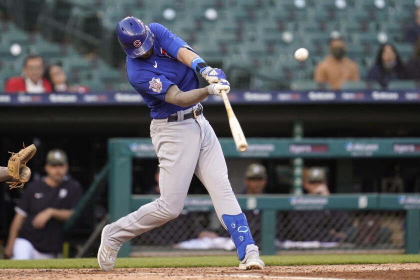 Chicago Cubs' Kris Bryant hits a two-run home run against the Detroit Tigers in the third inning of a baseball game in Detroit, Friday, May 14, 2021. (AP Photo/Paul Sancya)