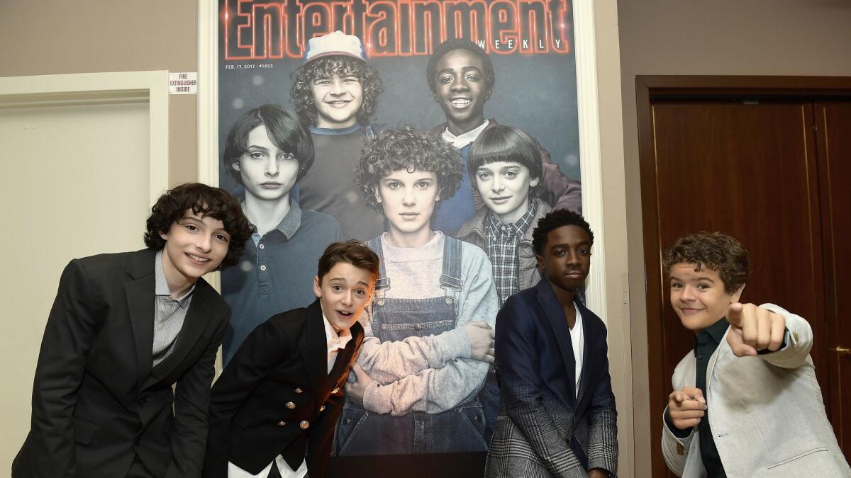 Finn Wolfhard, from left, Noah Schnapp, Caleb McLaughlin and Gaten Matarazzo attend the 2017 Entertainment Weekly's pre-Emmy party at Sunset Tower Hotel in West Hollywood on Friday.