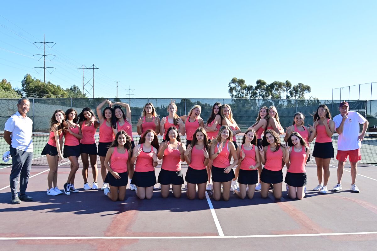 This year's varsity tennis squad on the tennis courts.