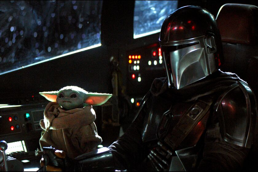 The Child and Mando in 'The Mandalorian'