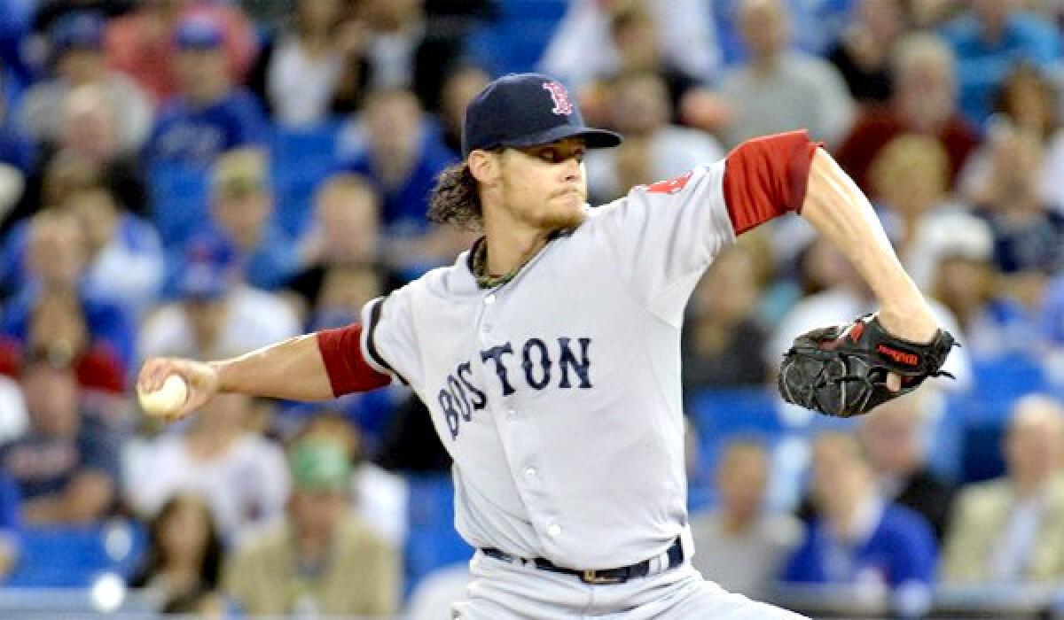 Red Sox pitcher Clay Buchholz, whose 6-0 record leads the majors, denies accusations from a Blue Jays radio color commentator that he cheated during Boston's 10-1 victory over Toronto on Wednesday.