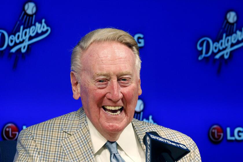 Dodgers Hall of Fame broadcaster Vin Scully announces he will return to broadcast his 67th, and last, baseball season in 2016 during a news conference on Saturday.
