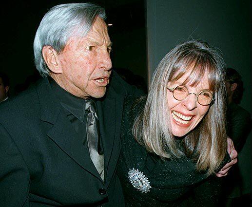 Rauschenberg and Diane Keaton attend Rauschenberg's lifetime retrospective at the Solomon R. Guggenheim Museum in New York in the late 1990s.