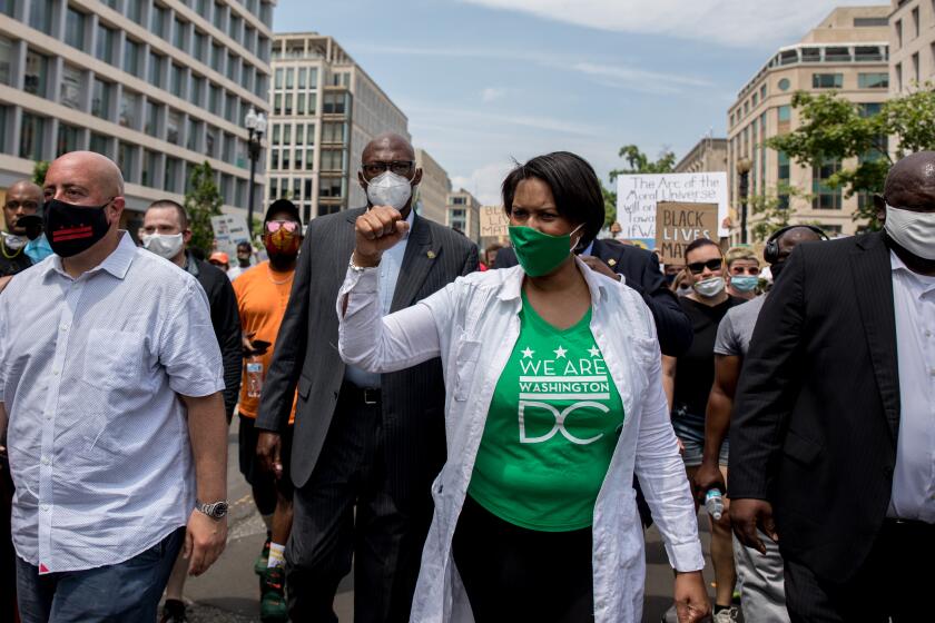 WASHINGTON,DC-JUNE6: Mayor Muriel Bowser walks down 16th Street during the 9th day of protests on 16th Street outside of the White House in Washington, DC, June 6, 2020. (Photo by Evelyn Hockstein/For The Washington Post via Getty Images)