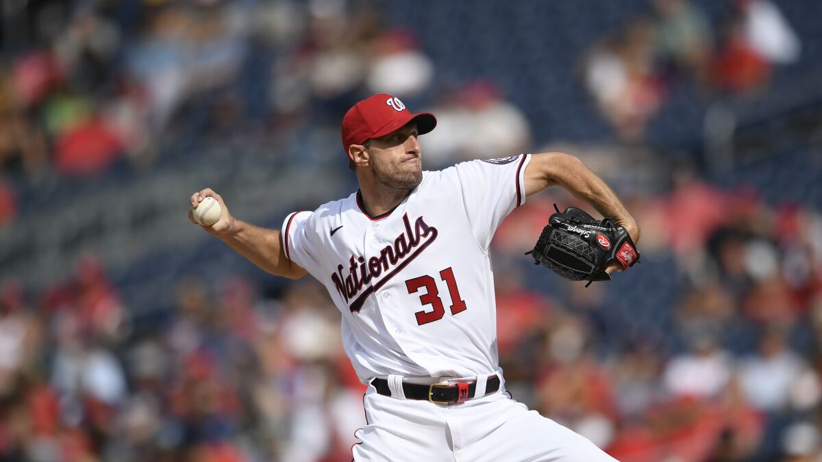 Washington Nationals pitcher Max Scherzer delivers a pitch against the San Diego Padres.