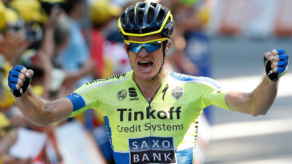 Michael Rogers celebrates after winning Stage 16 of the Tour de France on Tuesday.