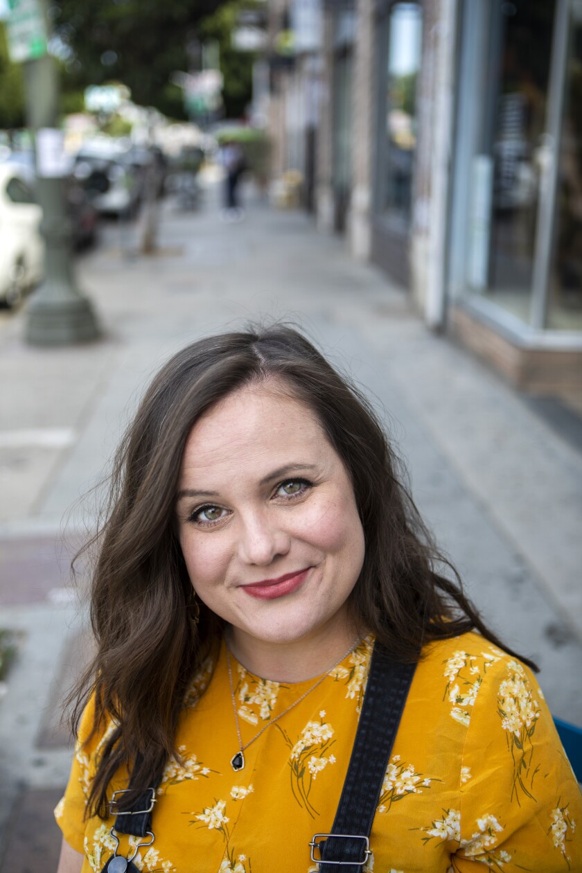 Katherine Swope outside the Stories Books & Cafe.