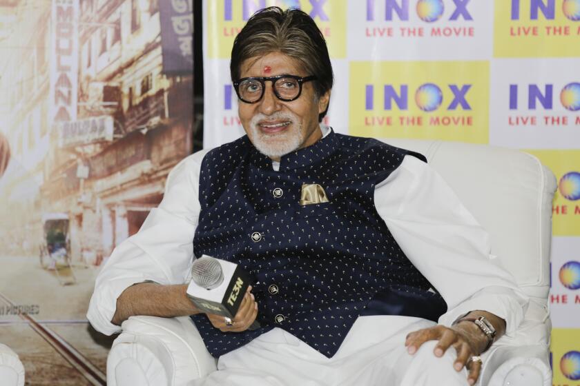 FILE - Bollywood film actor Amitabh Bachchan talks to media during a promotional event of his film 'TE3N' or three in Kolkata, India, on June 8, 2016. Amitabh Bachchan said he was injured during a film shoot and is recovering at home in India's Mumbai city in a blog post published on Sunday night, March 5, 2023. (AP Photo/ Bikas Das, File)