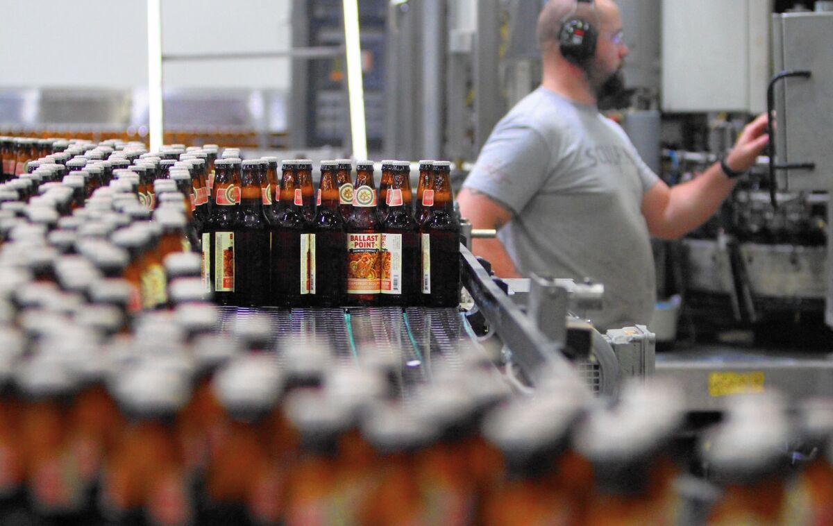 Bottles of beer on a production line