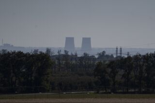 FILE - Zaporizhzhia nuclear power plant is seen from around twenty kilometers away in an area in the Dnipropetrovsk region, Ukraine, Monday, Oct. 17, 2022. A statement released Friday, May 26, 2023, by the intelligence directorate of Ukraine's Defense Ministry claimed that Russian forces would strike the Zaporizhzhia nuclear power plant, the biggest in Europe, and then report a radioactive leak in order to trigger an international probe that would pause the hostilities and give the Russian forces the respite they need to regroup ahead of the counteroffensive. (AP Photo/Leo Correa, File)
