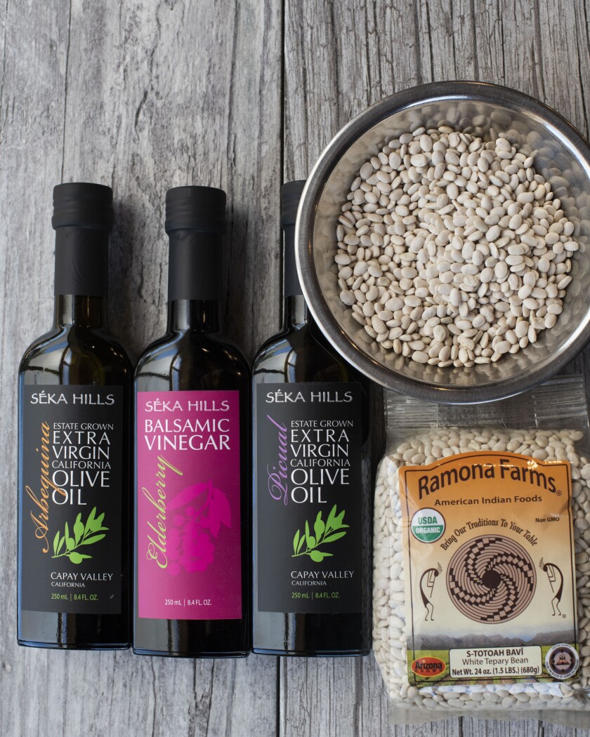 Tepary beans from Ramona Farms in Arizona and oils and vinegars from Seka Hills in California are sold at the marketplace.