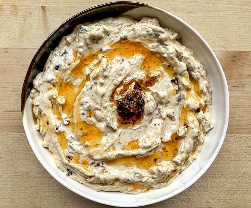 Fried onion-Chilli crisp dip in a round bowl