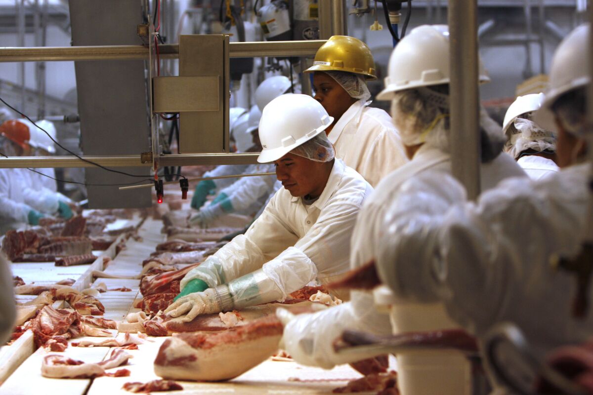 Pork processing workers