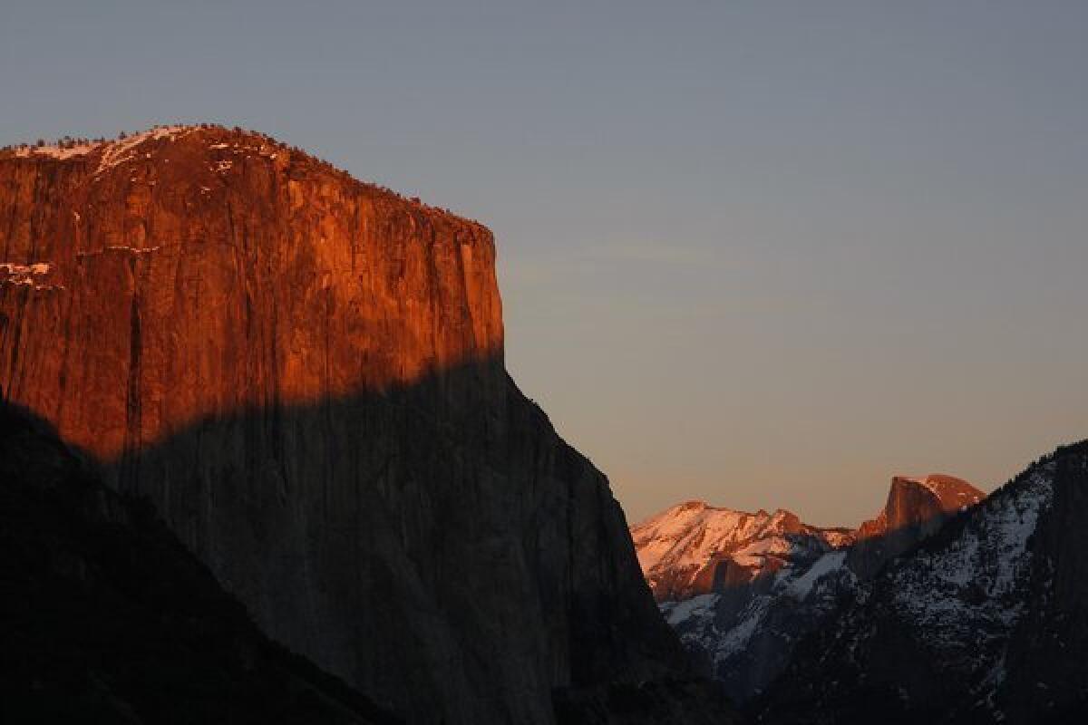 El Capitan, left and Half Dome, far right, in Yosemite National Park. El Capitan stands about 3,000 feet above the Yosemite Valley floor.