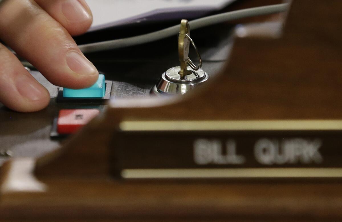 Assemblyman Bill Quirk (D-Hayward) votes on budget-related bills.