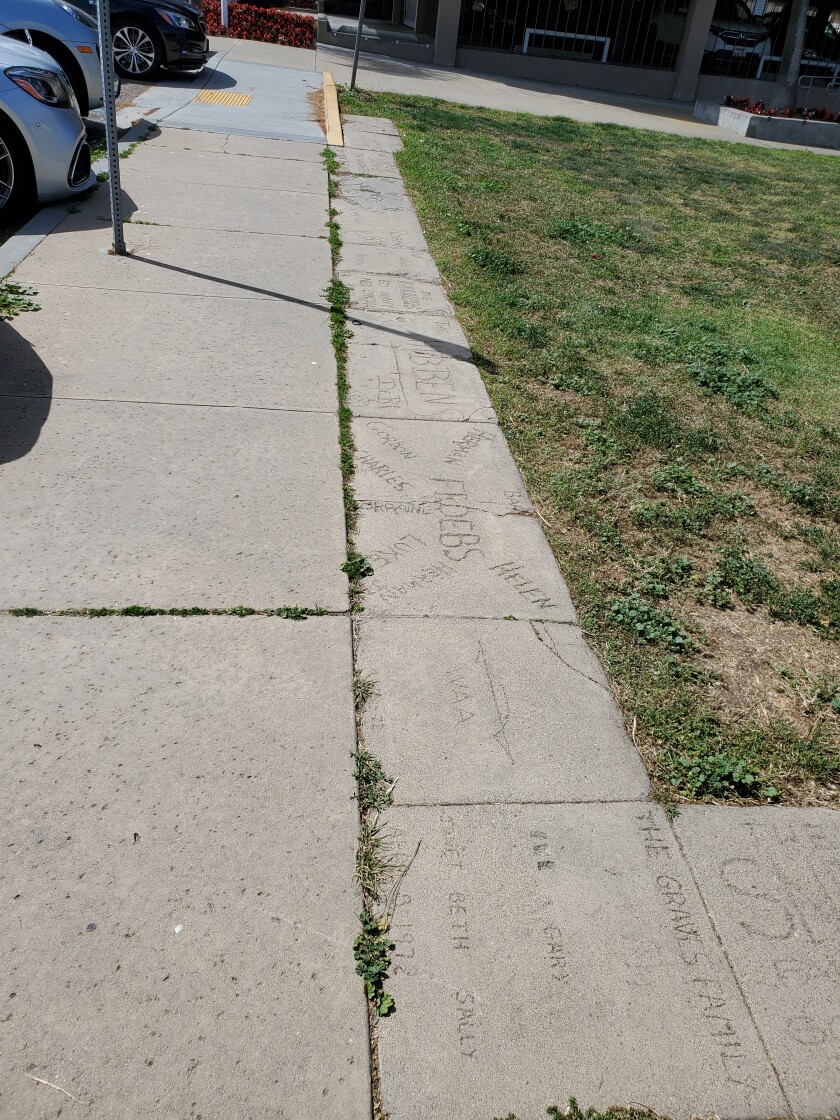 Engraved concrete slabs that line Laureate Park (also known as Mata Park) remain from 50 years ago.
