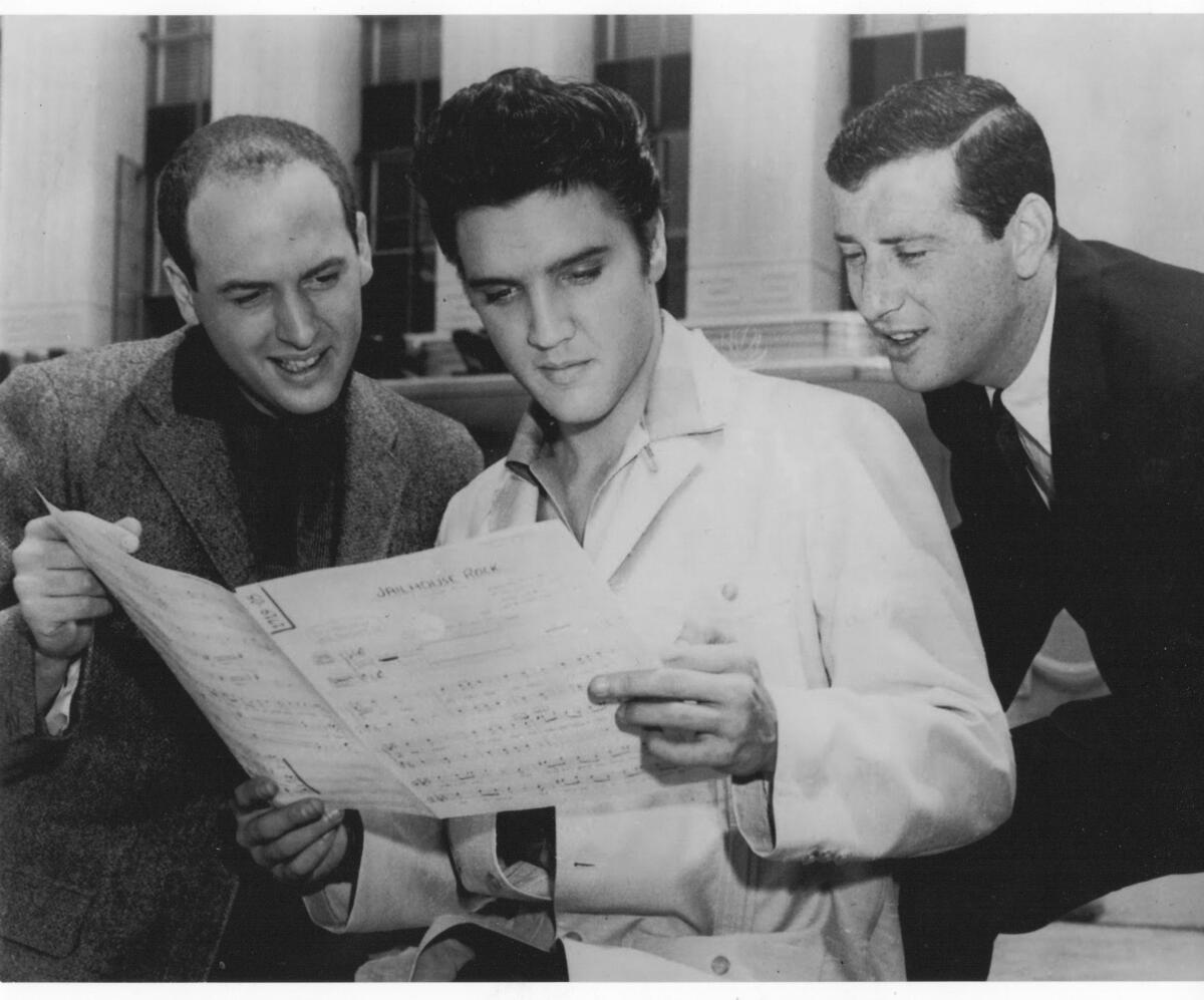Mike Stoller, left, with Elvis and Jerry Leiber in 1957.