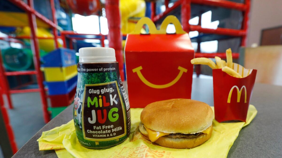 McDonald's will soon banish cheeseburgers and chocolate milk from its Happy Meal menu.