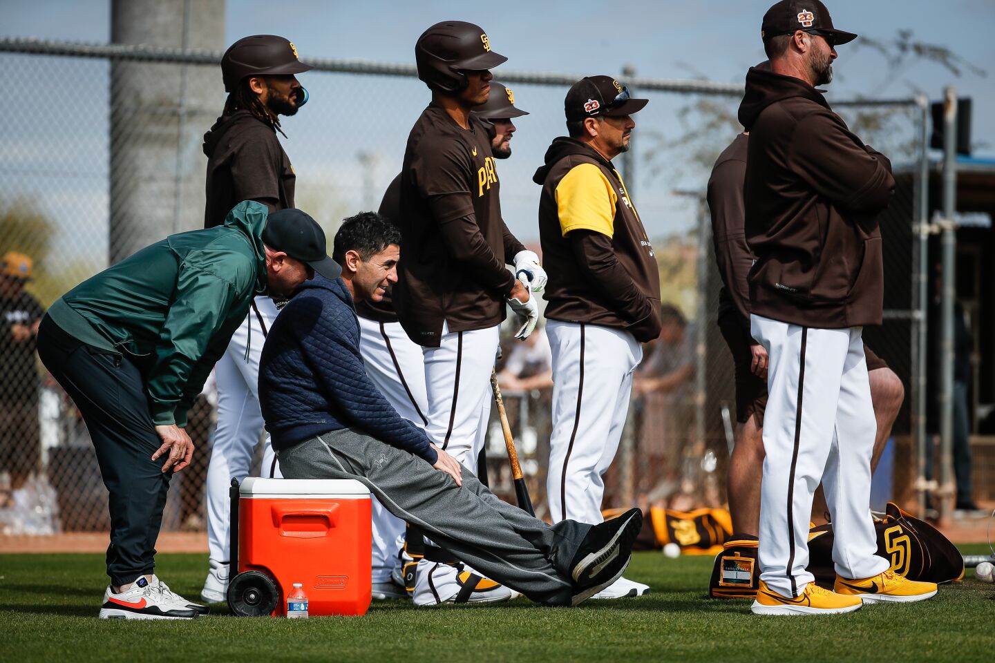 Padres assistant general manager Josh Stein and general manager AJ Preller chat during a spring training practice at the Peoria Sports Complex on Tuesday, Feb. 21, 2023 in Peoria, AZ.