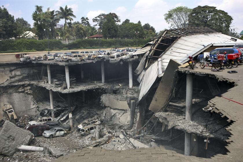 The collapsed parking structure at the Westgate shopping mall in Nairobi, Kenya. Two more attacks in the north of the country underscored continuing security problems.