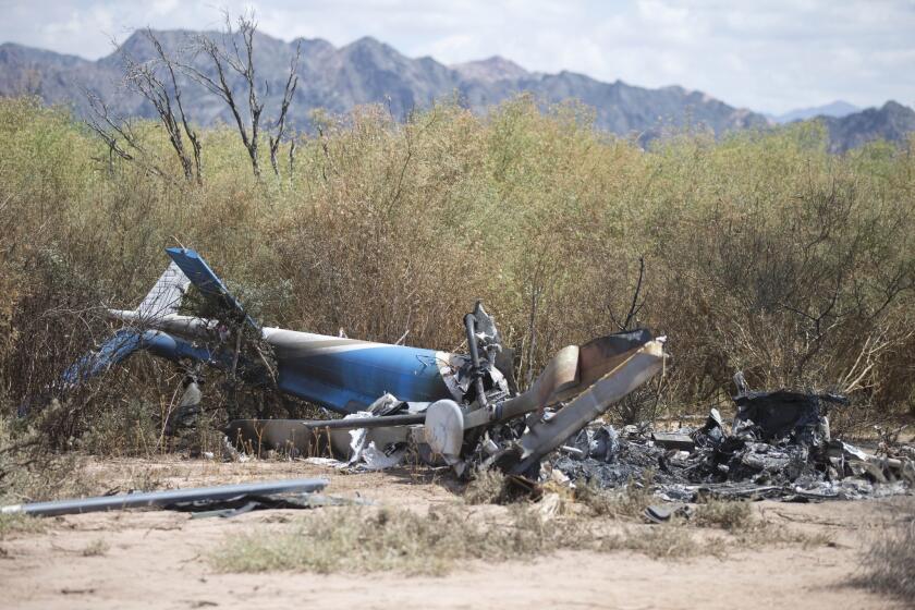 A view of the wreckage of one of two helicopters that collided in midair, near Villa Castelli, in Argentina's La Rioja province.