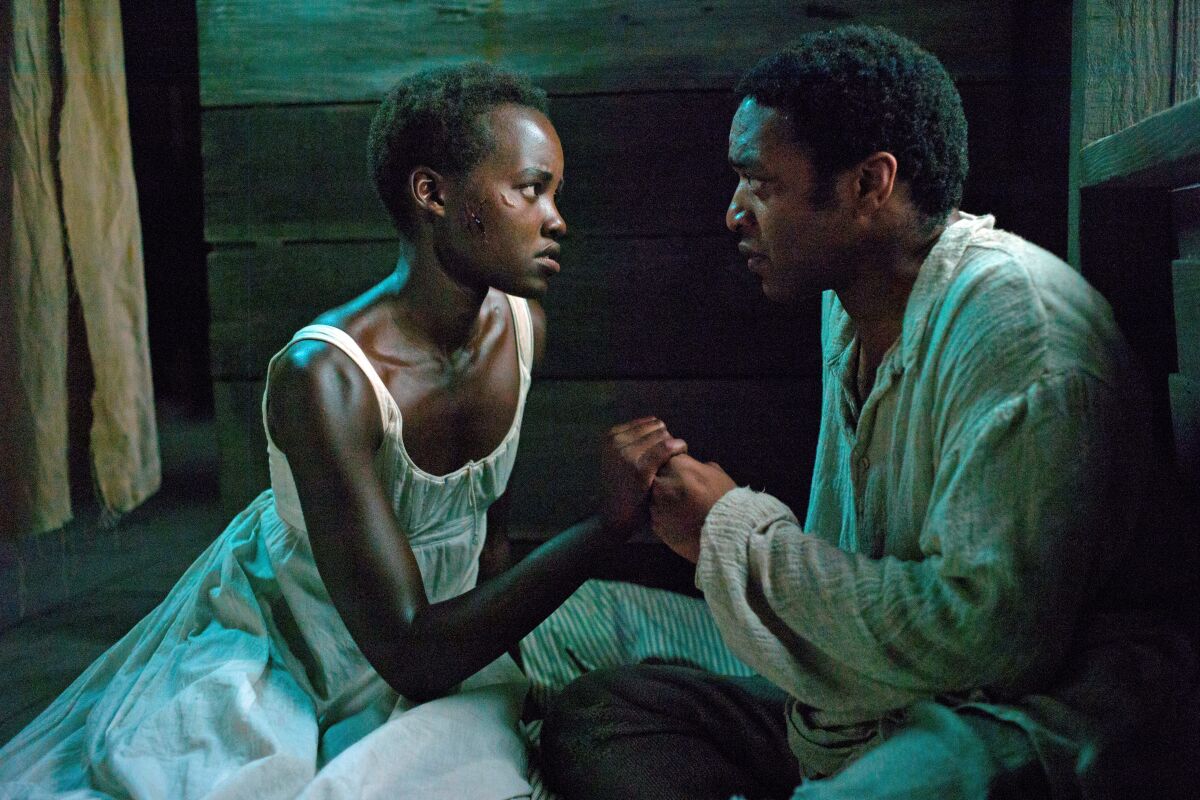 Lupita Nyong'o and Chewitel Ejiofor in “12 Years a Slave” (2013).