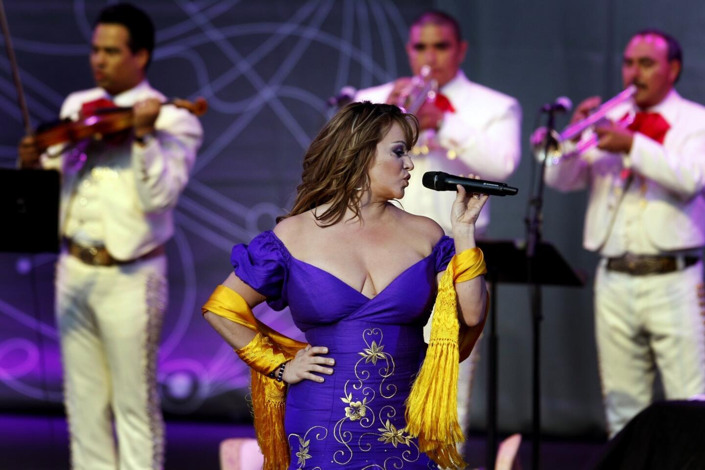 Jenni Rivera performs Saturday night at the Lilith Fair concert tour which made a stop at the Verizon Amphitheater.