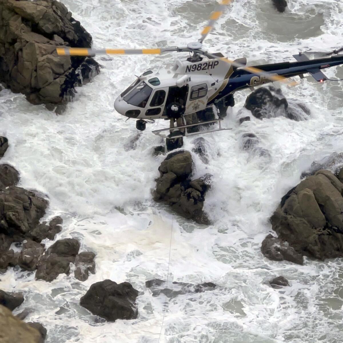 Helicopter over roiling surf