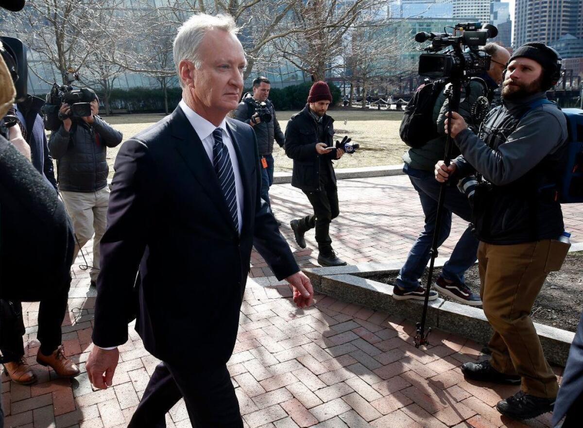 Toby Macfarlane in April departs federal court in Boston after facing charges in a nationwide college admissions bribery scandal.