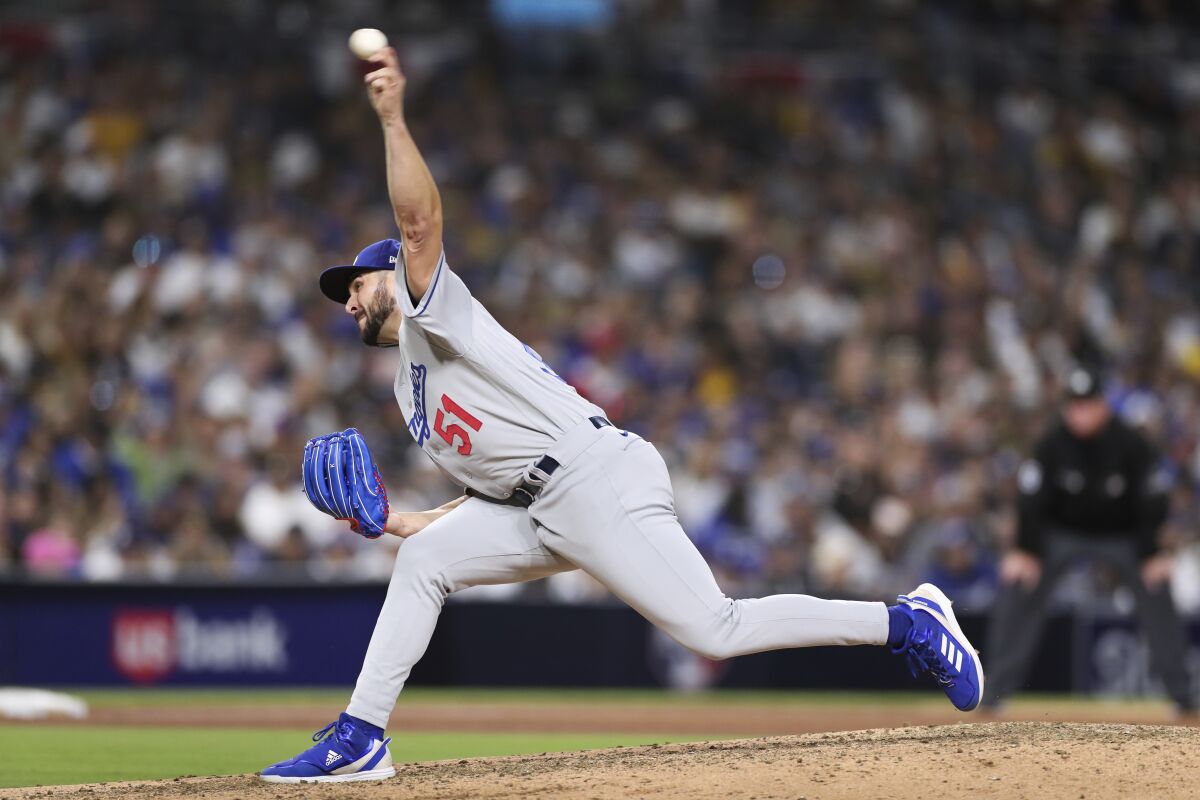Dodgers relief pitcher Alex Vesia works against the San Diego Padres.