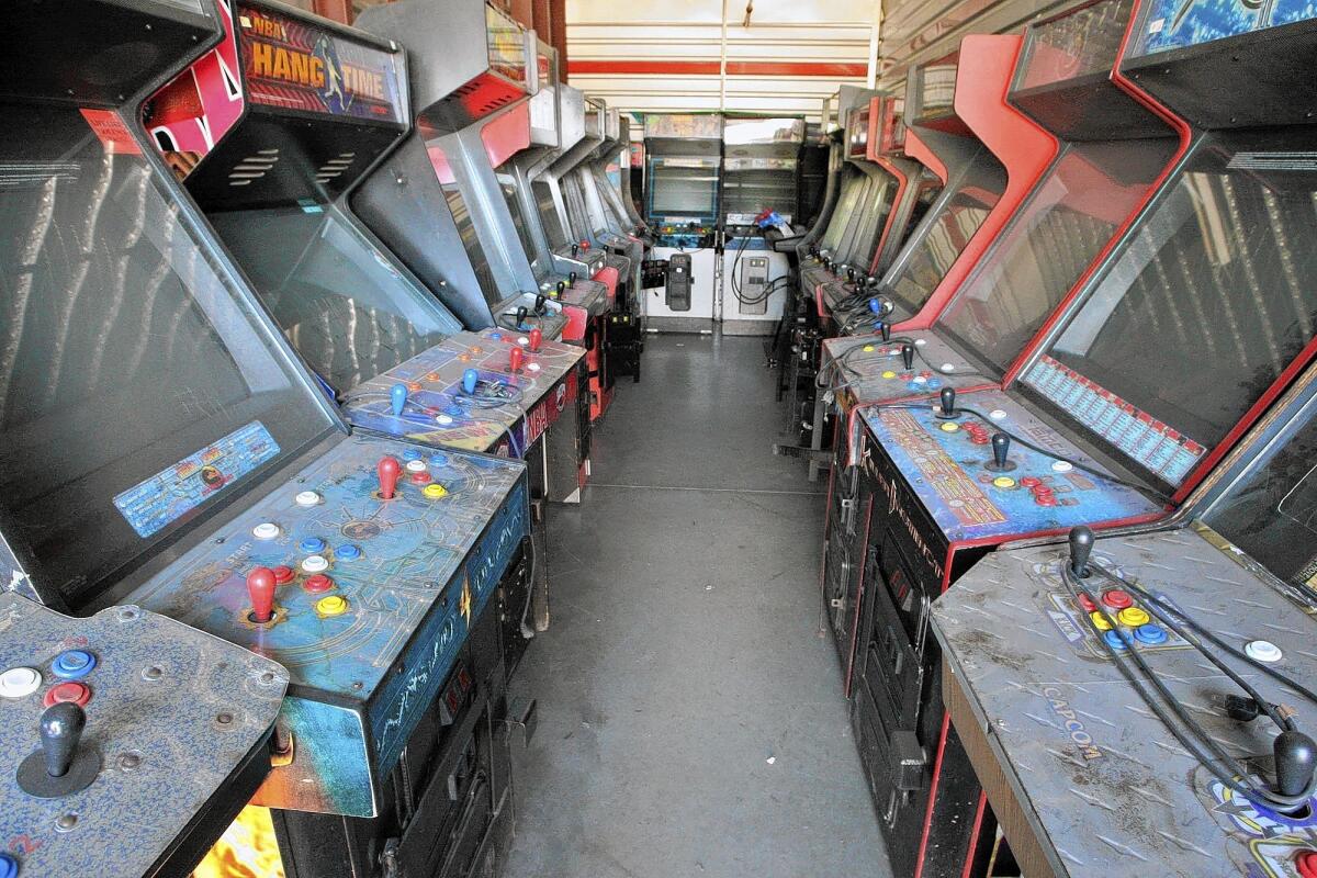 In this Oct. 2013 photo, disconnected arcade machines line one of three storage units rented by the City of Glendale. Storage space cost $1,800 a month for all the arcade machines, but the tab was picked up by the money the Successor Agency made by selling off old redevelopment assets, Lorenz said.