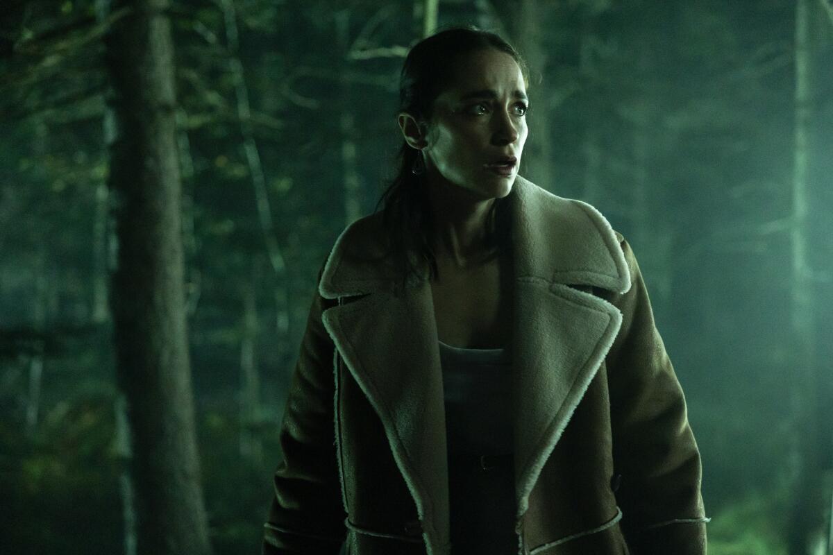 a woman in the woods