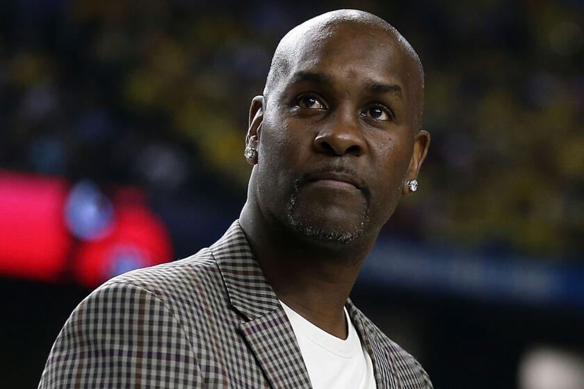 Gary Payton, shown in 2013, believes a number of former NBA players should have been unanimous MVPs before Stephen Curry.