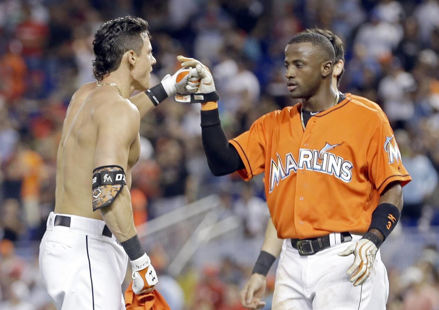 Dietrich's RBI triple in 9th helps Marlins beat Cards 5-4 - The San Diego  Union-Tribune