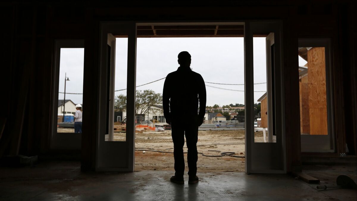 Harland Brewing Co. CEO Josh Landan stands in a tasting room that is being built at the One Paseo development in Del Mar on Dec. 10, 2018.