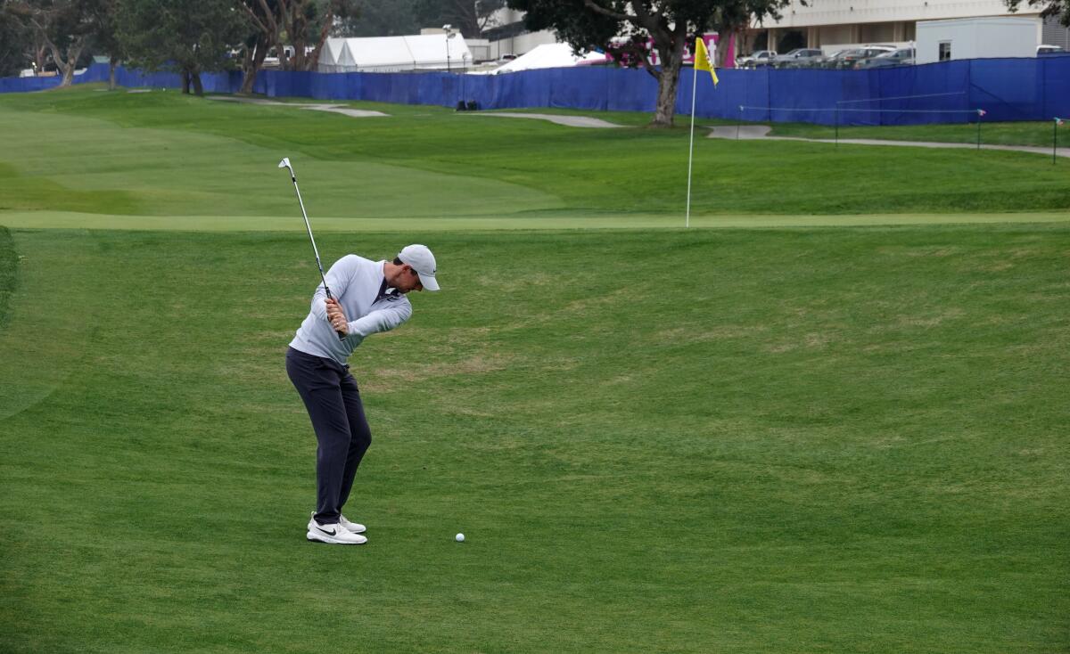 Rory McIlroy chips out of the reconfigured collection area behind the green on the ninth hole of Torrey Pines South Course during a practice round for the Farmers Insurance Open on Jan. 20, 2020.