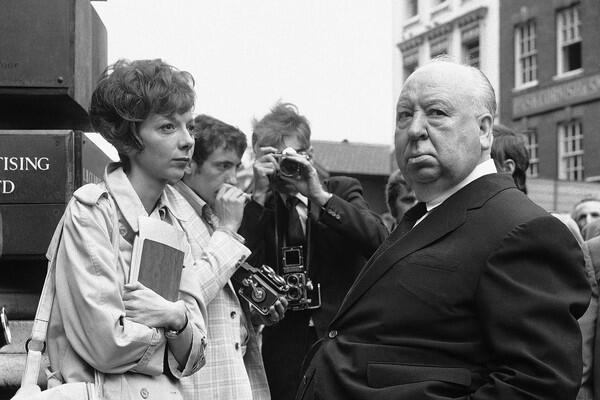Alfred Hitchcock discusses a scene with actress Anna Massey on the Covent Garden Market, London set of his thriller "Frenzy." The 1972 film was the director's first film to be shot in England in 33 years. Many critics regard it as his last great film.