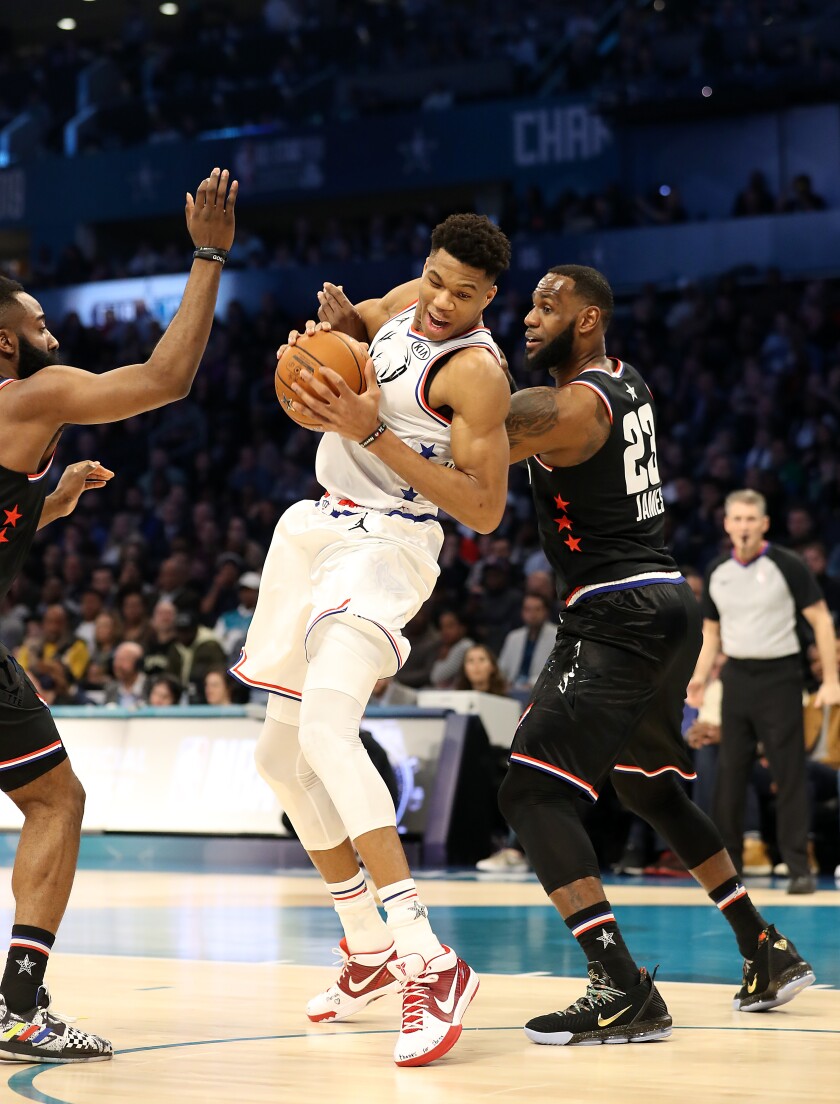 Giannis Antetokoumpo, center, between James Harden and LeBron James during the 2019 NBA All-Star game, is the only sure bet among Eastern Conference starters.