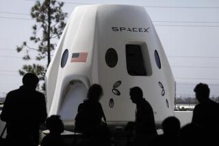 HAWTHORNE, CA - AUGUST 13, 2018 - A prototype of the Crew Dragon space craft was on display for members of the media at SpaceX in Hawthorne on August 13, 2018. (Genaro Molina/Los Angeles Times)