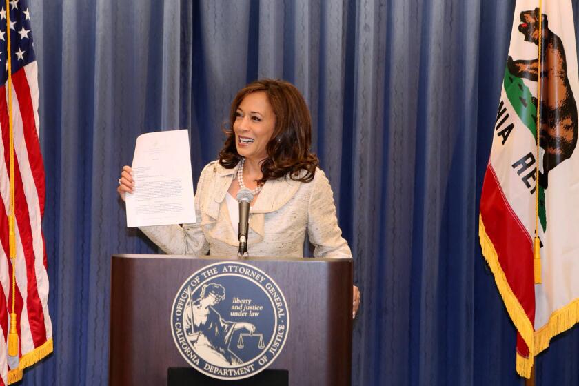 California Attorney General Kamala Harris discusses the Supreme Court ruling on Proposition 8 in Los Angeles Wednesday, June 26, 2013. The justices issued two 5-4 rulings in their final session of the term. One decision wiped away part of a federal anti-gay marriage law that has kept legally married same-sex couples from receiving tax, health and pension benefits. The other was a technical legal ruling that said nothing at all about same-sex marriage, but left in place a trial court's declaration that California's Proposition 8 is unconstitutional. (AP Photo/Damian Dovarganes)