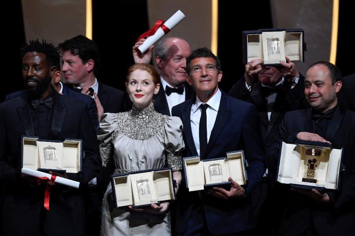 (From left) Jury Prize winner French director Ladj Ly, best actress winner British actress Emily Beecham, best director winners Belgian director Luc and Jean-Pierre Dardenne, best actor winner Spanish actor Antonio Banderas and Camera d'Or winner Cesar Diaz.