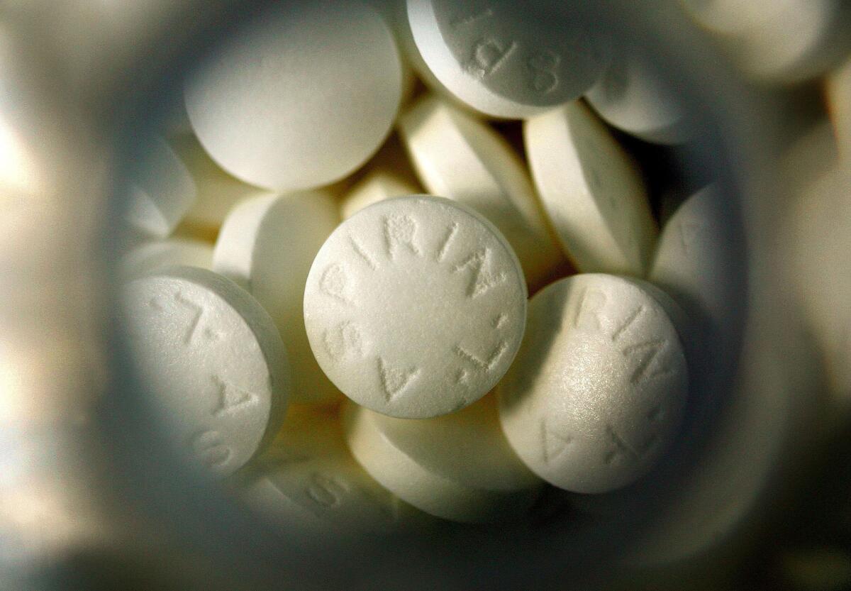 Recent research suggests a daily dose of aspirin might reduce the risk of certain types of cancer -- but it also might give you bleeding ulcers.