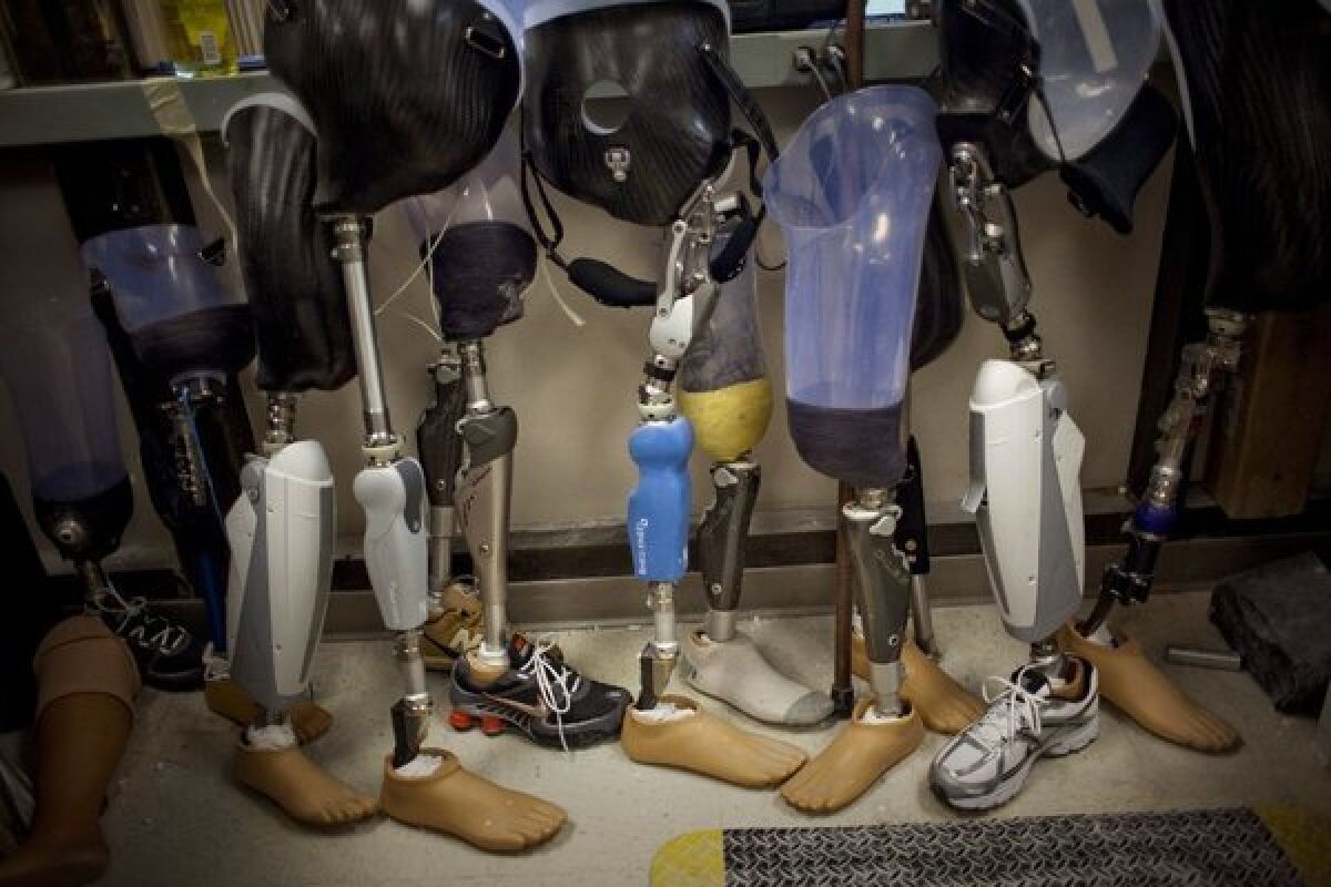 The lifetime cost of losing a limb can run to $500,000, and health insurers often impose strict limits on reimbursement for such care. A new coalition of prosthetics and orthotics makers has said it will step in to help Boston Marathon amputees with little or no insurance coverage.