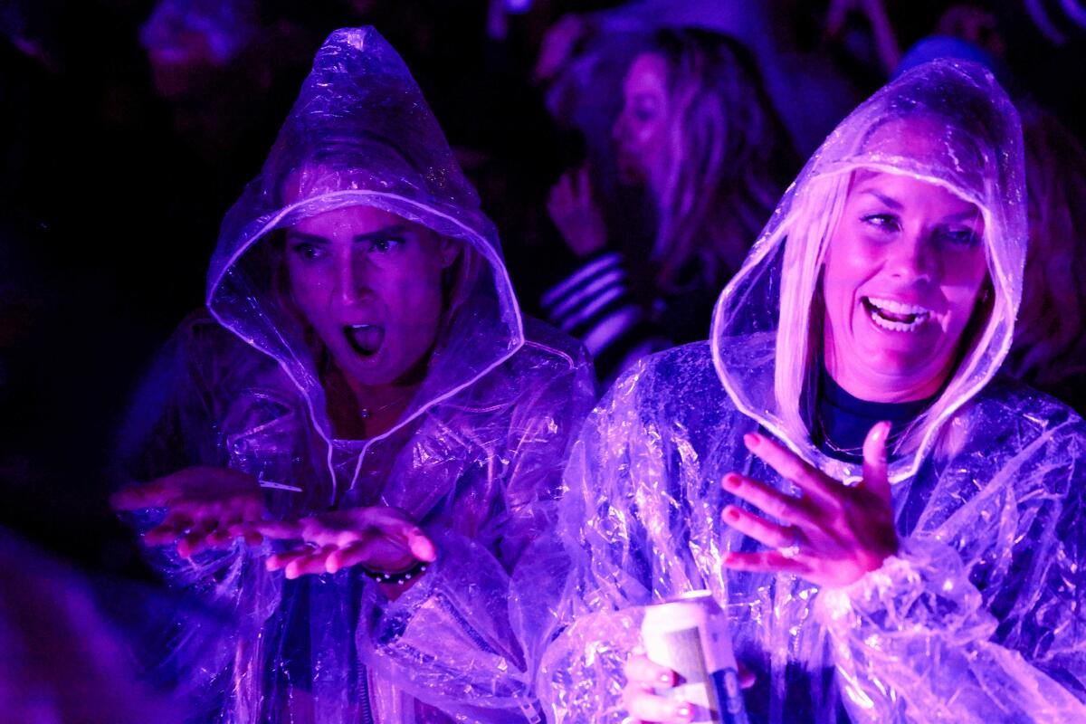 Fans in the rain at Billy Joel concert at Petco Park, April 13, 2024 in San Diego