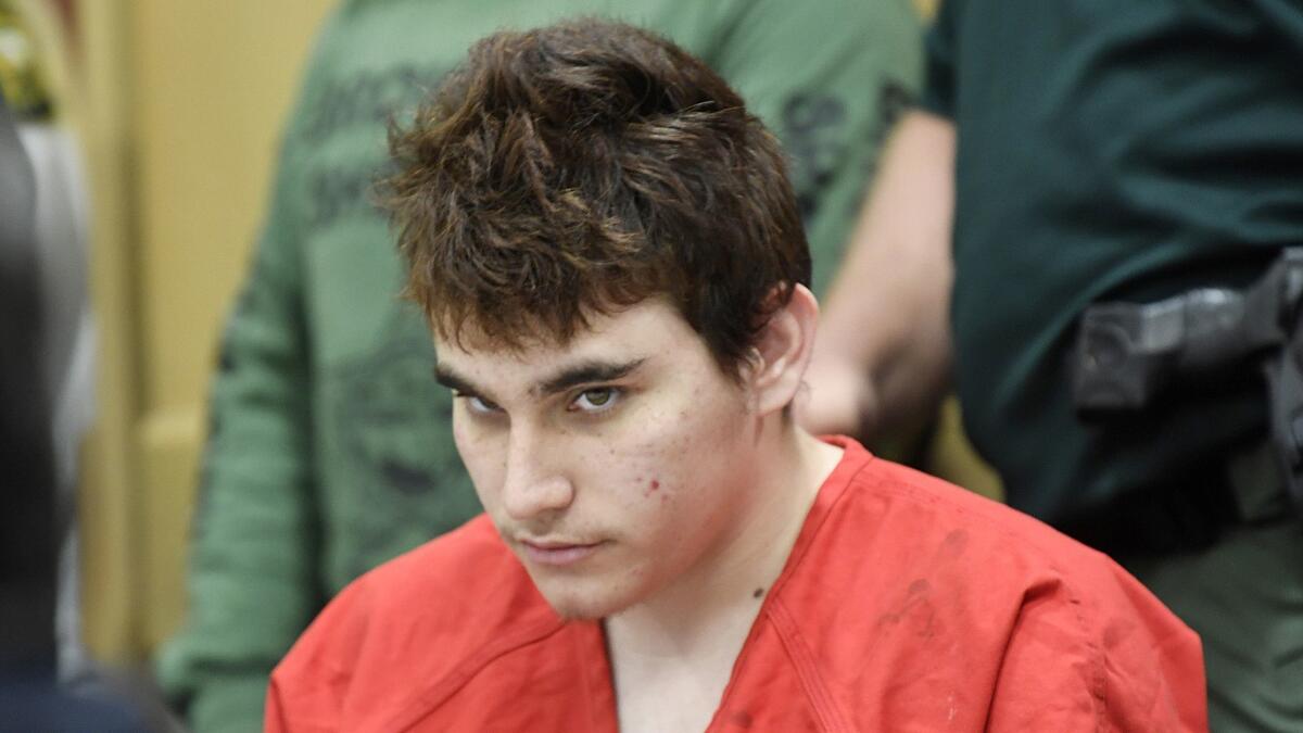 Florida school officials released a long-awaited report on Parkland, Fla., shooter Nikolas Cruz, here in April court appearance.