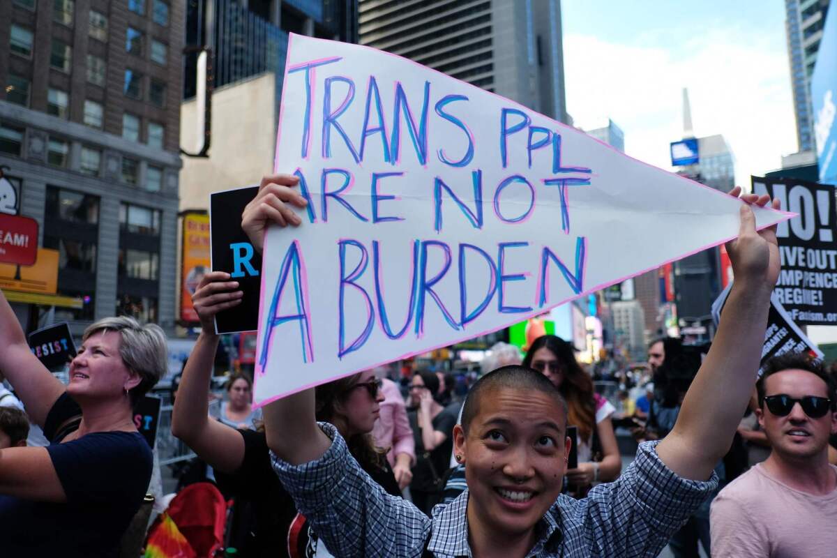 Protesters demonstrate in New York's Time Square in July over President Trump's ban on transgender people joining the military.