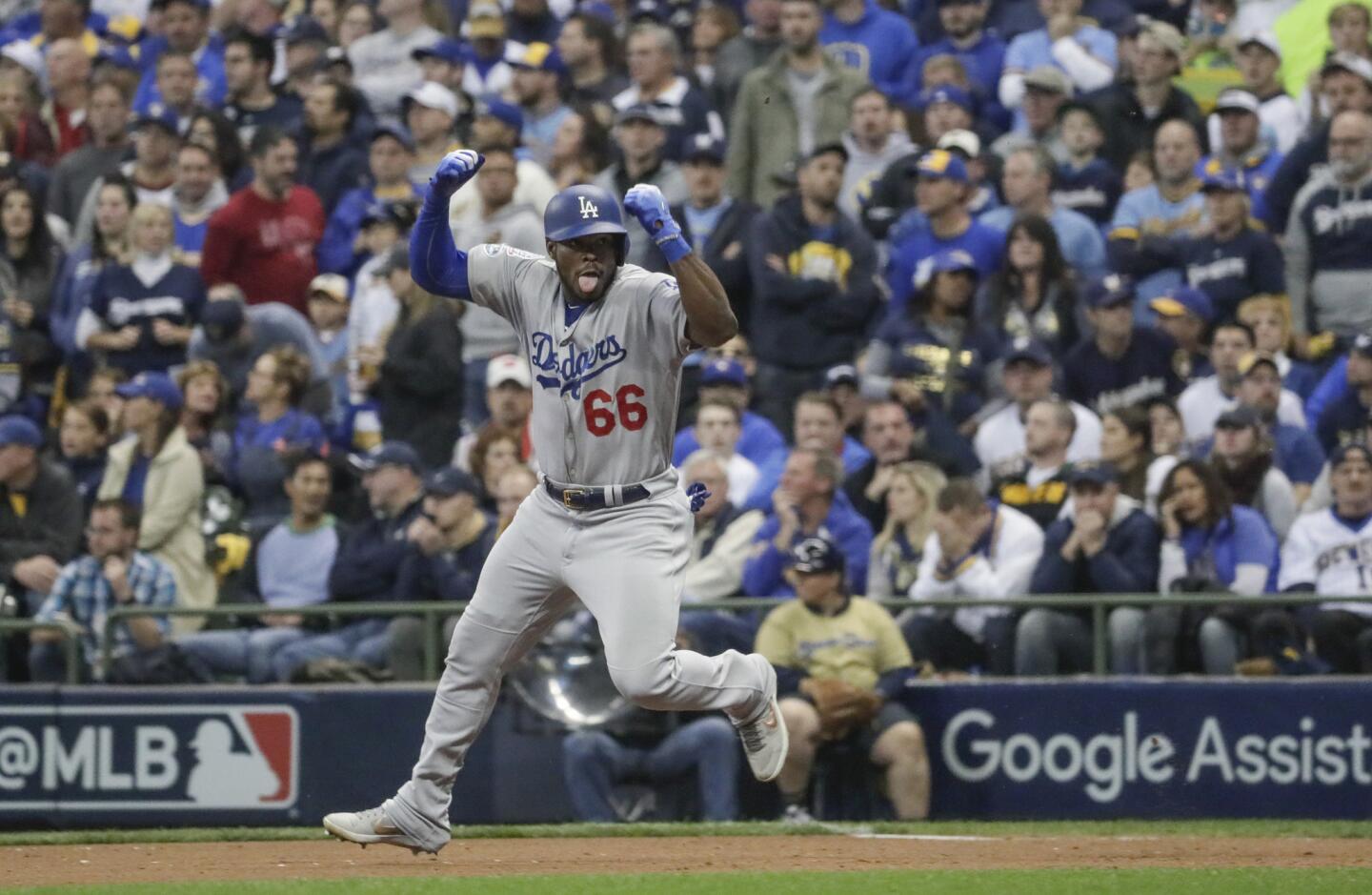Yasiel Puig celebrates after hitting a three run homer in the sixth inning.